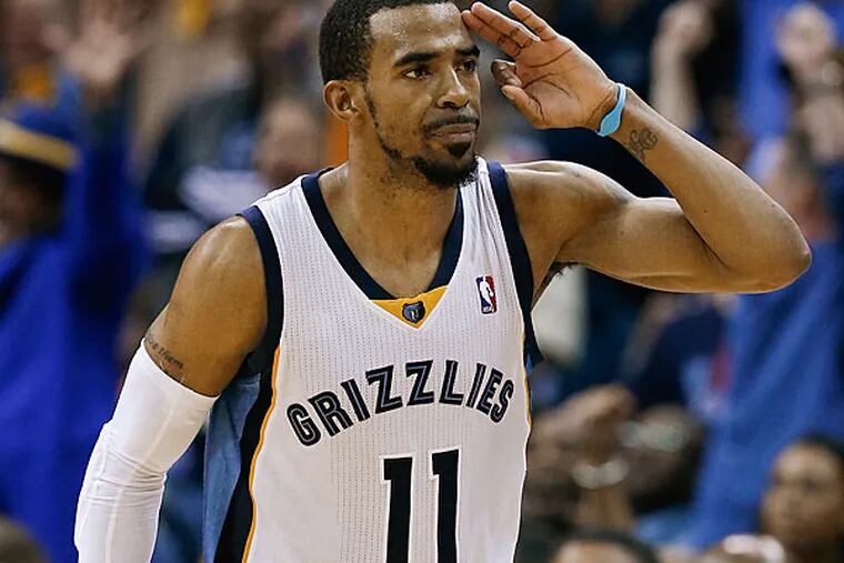 Grizzlies guard Mike Conley celebrates after scoring against the Oklahoma City Thunder in overtime of Game 3 of an opening-round NBA basketball playoff series Thursday, April 24, 2014, in Memphis, Tenn. The Grizzlies won 98-95. (Mark Humphrey/AP)