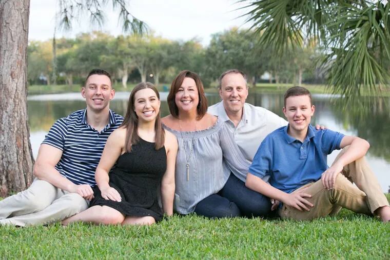 Robin Hauser (center), a pediatrician in Tampa, Fla., got COVID-19 in February, seven weeks after receiving her second dose of vaccine. Daughter Molly and son Brady (right) live at home and also got COVID-19, while husband Brian and son Jacob (left) did not.