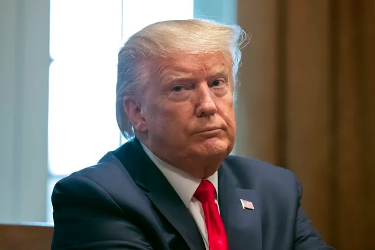 President Donald Trump listens during a White House meeting with representatives of American nurses on March 18, 2020.