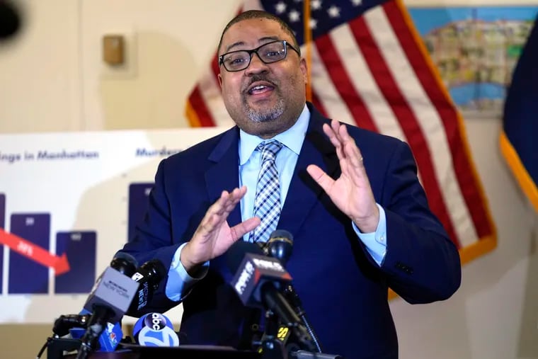 Manhattan District Attorney Alvin Bragg gestures while speaking during a news conference in February in New York.