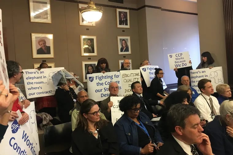 Members of the Community College of Philadelphia's faculty and staff union showed up to Professional Development Week in January 2018 with signs protesting their current contract negotiation stalemate.