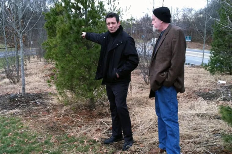 Civil rights activist Patrick Duff (left) and historian and author Bill Kelly on Main Street in Maple Shade where Martin Luther King Jr. was refused service. Route 73 can be seen in the background.