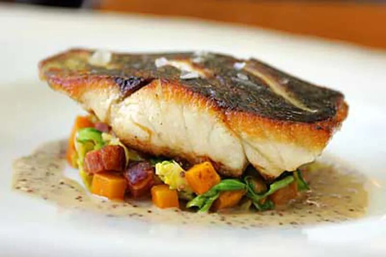 Japanese black bass, served at Little Fish: Sustainable and a new flavor. (DAVID SWANSON / Staff Photographer)