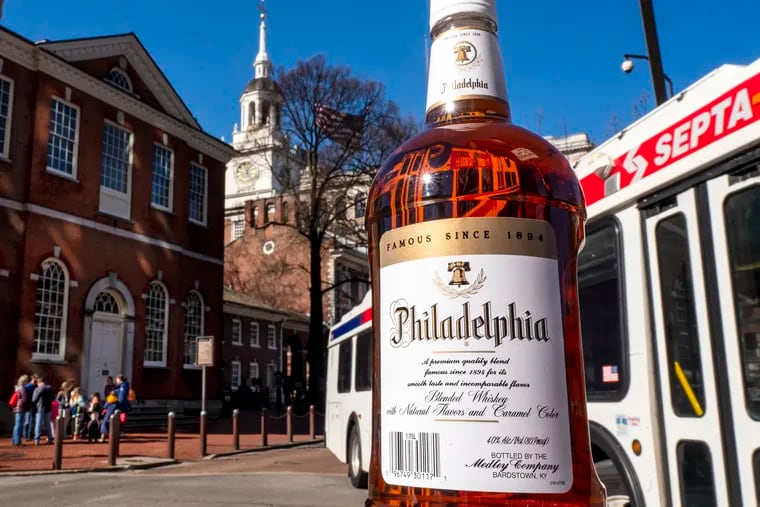 A bottle of Philadelphia Whiskey is photographed outside Independence Hall.