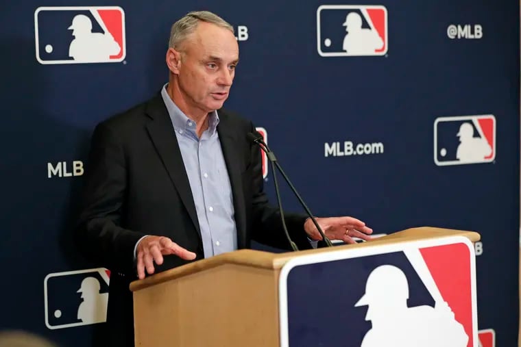 Rob Manfred has a big decision to make over the next month. (AP Foto/John Raoux)