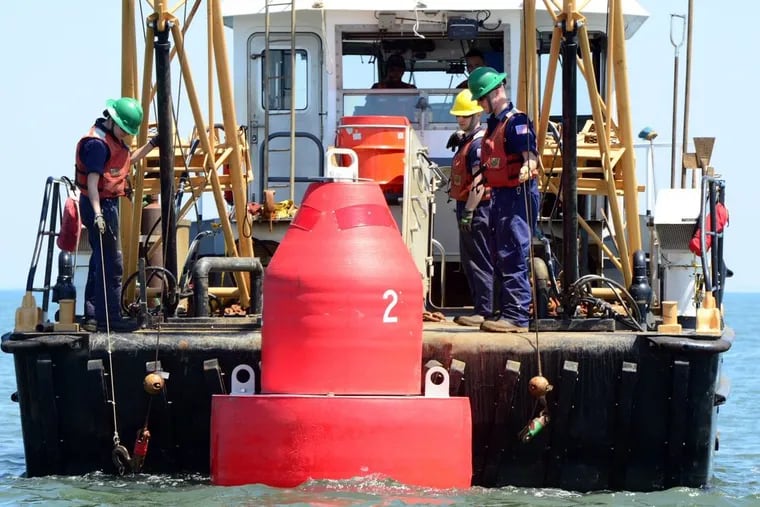 The Coast Guard has installed eight buoys to  mark the newly dredged channel through Little Egg Inlet.