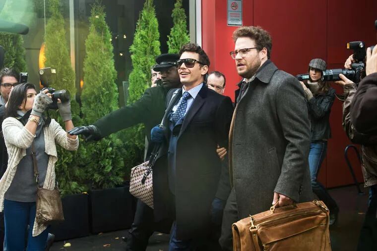 James Franco (center) and Seth Rogen (right) in Sony's controversial &quot;The Interview.&quot;