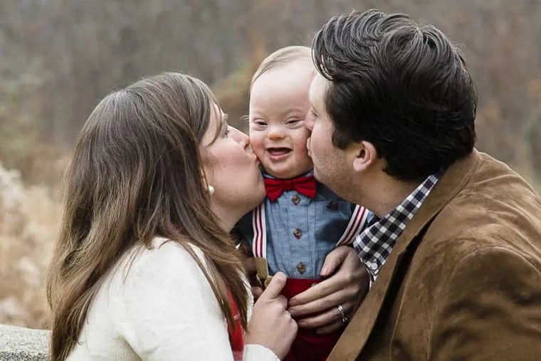 James and Kelly Coughlin with their son Patrick, who has Down syndrome.