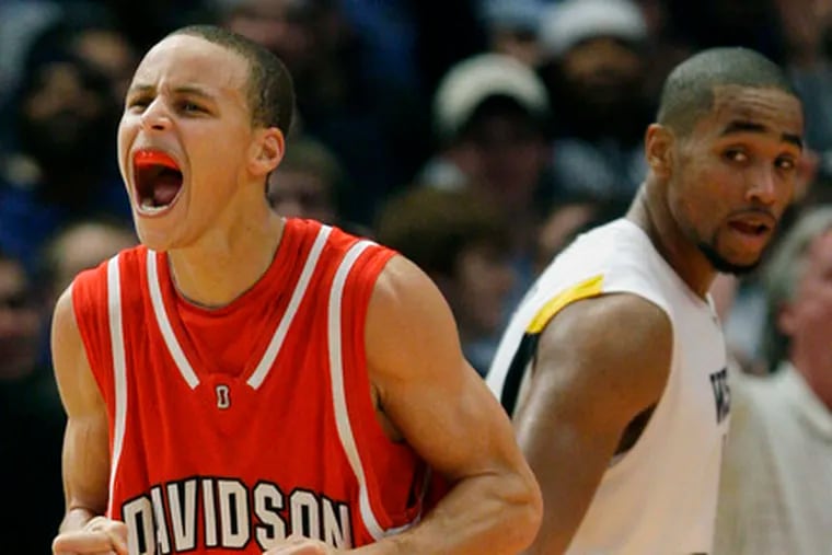 Davidson&#0039;s Stephen Curry reacts after West Virginia turnover.