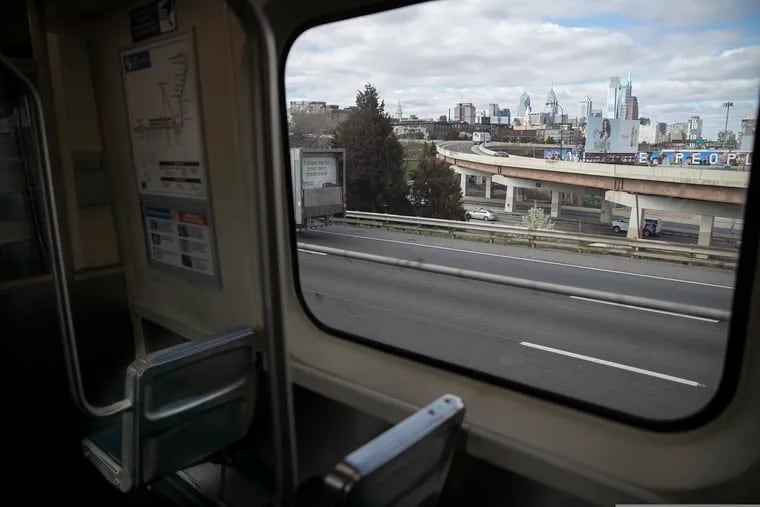 The Philadelphia skyline is seen from a window of the SEPTA Market-Frankford Line heading westbound on March 24.
