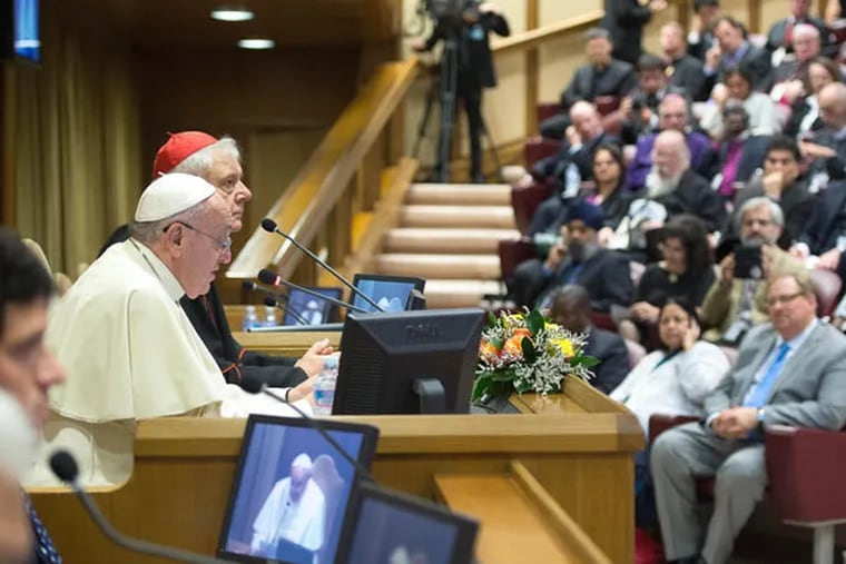 Pope Francis speaks at the Vatican Monday morning. (AP Photo/L'Osservatore Romano, HO)