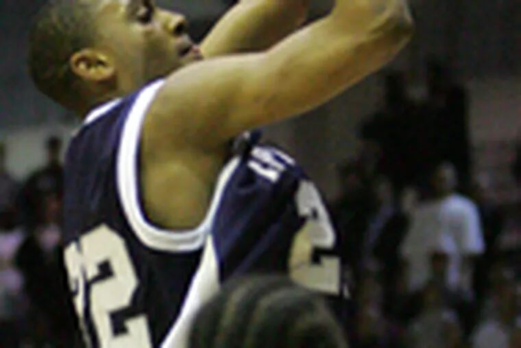 Back in his Episcopal Academy days , Ellington goes up for the game-winner against Neumann-Goretti in January 2006.