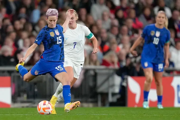 Megan Rapinoe (left) missed the U.S. women's soccer team's trip to New Zealand last month because of an ankle injury.