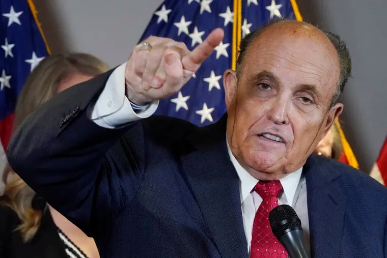 Trump campaign lawyer Rudy Giuliani speaks during a Thursday news conference at the Republican National Committee headquarters in Washington.