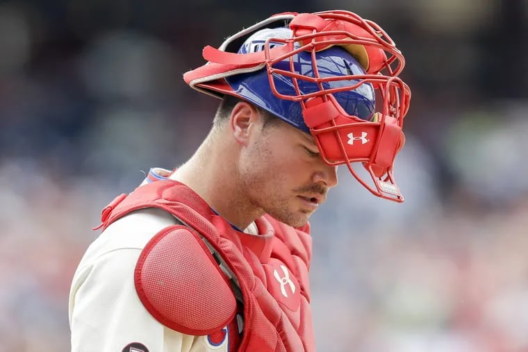 Phillies catcher Andrew Knapp looks to the ground during a loss to the Padres on Saturday,