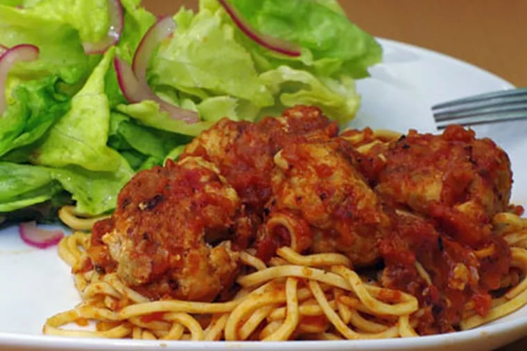 The finished dish -- Chicken and Ricotta Meatballs, handmade pasta, salad. (Photo: Joy Manning)