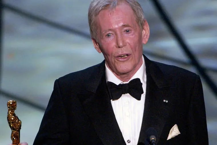 FILE - In this March 23, 2003 file photo, Actor Peter O'Toole accepts his honorary Oscar from the Academy of Motion Picture Arts and Sciences during the 75th annual Academy Awards telecast in Los Angeles. O'Toole, the charismatic actor who achieved instant stardom as Lawrence of Arabia and was nominated eight times for an Academy Award, has died. He was 81. O'Toole's agent Steve Kenis says the actor died Saturday, Dec. 14, 2013 at a hospital following a long illness. (AP Photo/Kevork Djansezian)