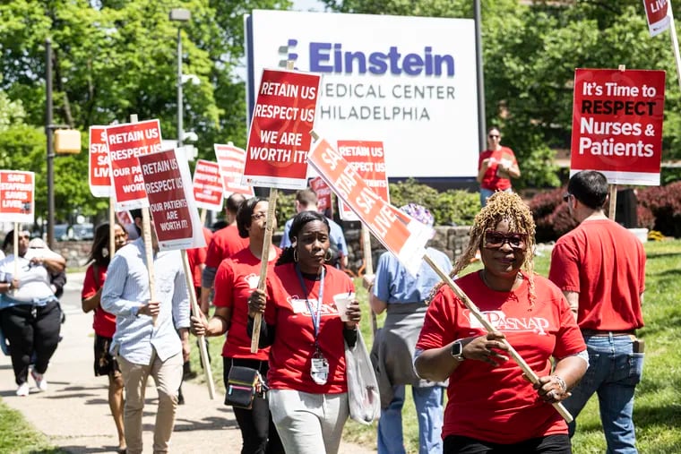 Health professionals rally on Thursday, May 11, 2023, outside the Albert Einstein Medical Center in Philadelphia, Pa. Einstein nurses are currently in contract negotiations.