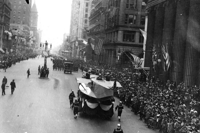 The unsuspecting throngs gather on Sept. 28, 1918 for the Liberty Loan parade on South Broad Street. The 200,000 people provided a rich breeding ground for the flu.