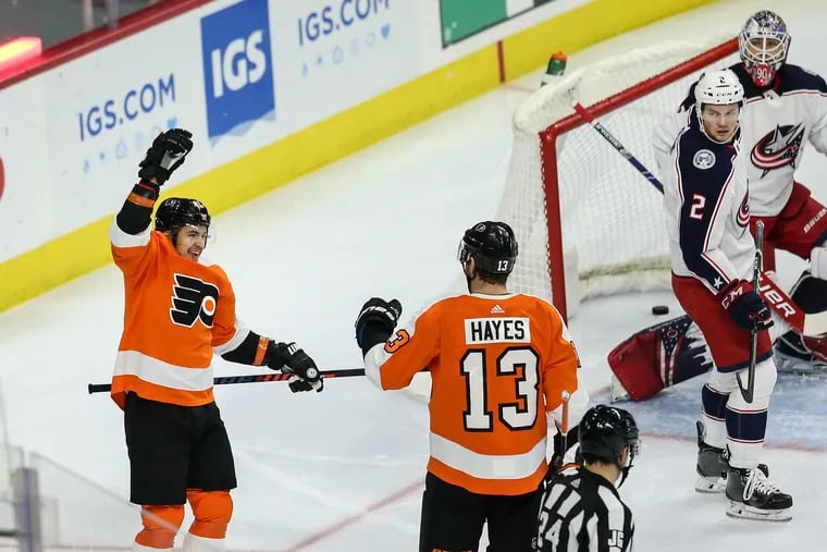 Kevin Hayes celebrates his goal with teammate Travis Konecny (left) in the Feb. 18 win over Columbus, which started the Flyers on their current eight-game winning streak.