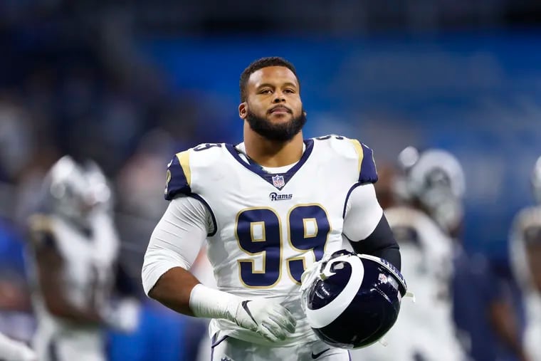 Los Angeles Rams defensive tackle Aaron Donald warms up before an NFL football game against the Detroit Lions in Detroit, Sunday, Dec. 2, 2018. (AP Photo/Paul Sancya)