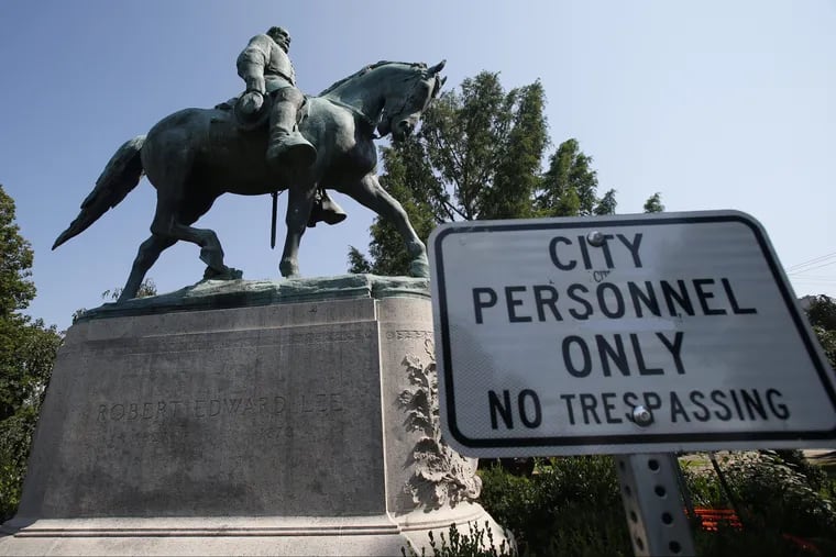 In this Monday, Aug. 6, 2018 photo, a No Trespassing sign is displayed in front of a statue of Robert E. Lee in Charlottesville, Va., at the park that was the focus of the Unite the Right rally.<br/>
A second rally, Unite the Right 2, is being held on Aug.12, the one-year anniversary of the violent Charlottesville protest.