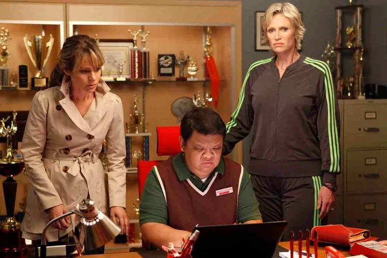 Jane Lynch (right) , as Sue, with Jessalyn Gilsig and Kent Avenido on &quot;Glee.&quot; A soft Sue was annoying.