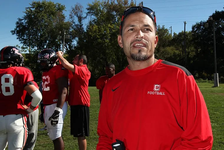 &quot; It's upsetting. But for me, personally, I've been down this road before. I still have a job to do. I have to continue to coach and lead this team." - Matt Ortega, coach of Coatesville's football team. STEVEN M. FALK / Staff Photographer