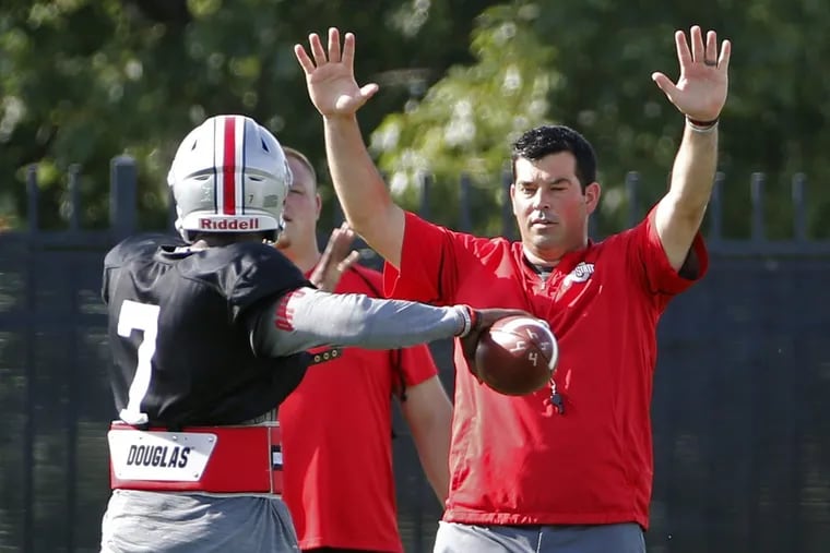 Ryan Day (right) will coach Ohio State during Urban Meyer's suspension.