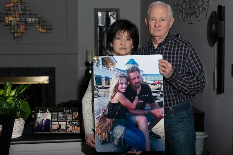 Roseann and Richard DeRosa, hold a photo of their daughter, Deana Eckman, who was killed by a repeat DUI driver. The DeRosas fought for years to have a bill named after their daughter pass in Harrisburg. This week, Gov. Tom Wolf signed it into law.