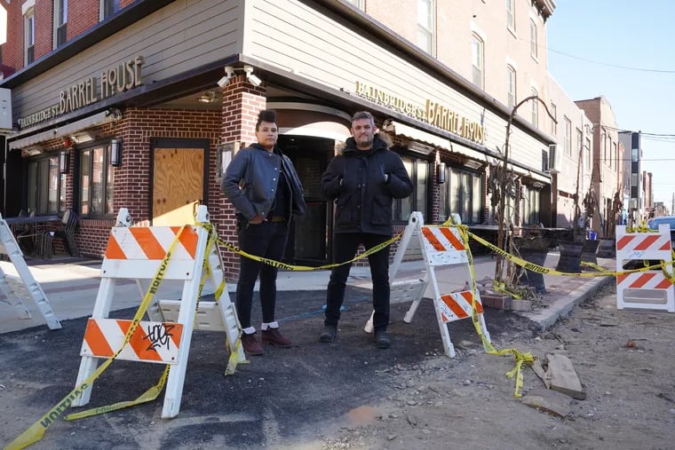 Chivonn Anderson (L) and Adam Volk pose at the former Bainbridge St. Barrel House, Adam Volk and Chivonn Anderson’s would-be new restaurant, in Philadelphia, Pa., on January 27, 2022. The opening is on hold because of a water main break that flooded the restaurant.