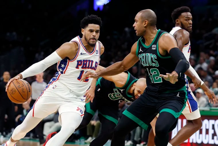 Tobias Harris (12), seen here driving against Al Horford, finished with 14 points, five rebounds, three assists and four steals.