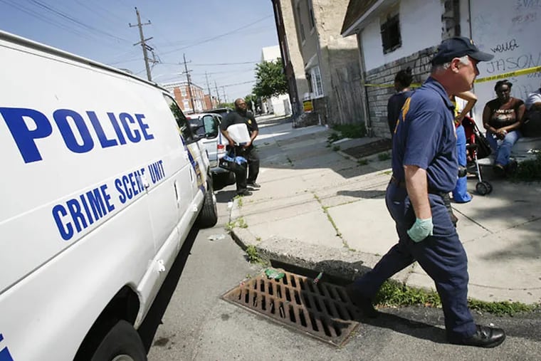 Philadelphia Crime Scene forensics investigators enter the house on Collins Street where a man was found dead Wednesday morning.

Philadelphia police investigate an alleged homicide along the 2600 block of Collins St. in Kensington section of Philadelphia on Wednesday morning June 2, 2010. ALEJANDRO A. ALVAREZ / PHILADELPHIA DAILY NEWS