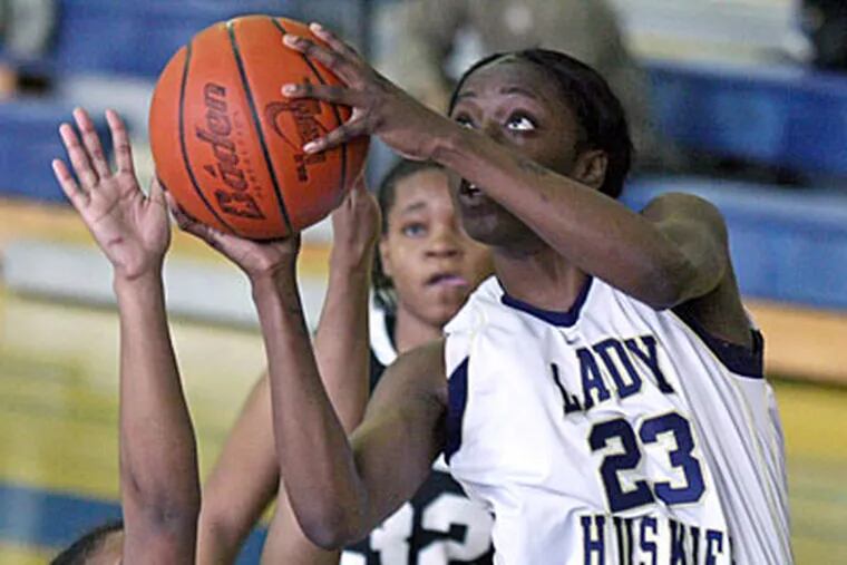 Prep Charter's Kahleah Copper puts up a shot while defended by Freire
Charter's Chantal Thomas. (Lou Rabito/Staff)