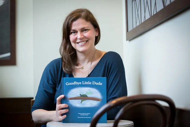 Amy Mack, a CHOP social worker, is running in the Boston Marathon on Monday to raise money for pediatric cancer and to honor the memory of Jonathan Smyth, a 7-year-old whose story of a rescued turtle became the subject of a children’s book.