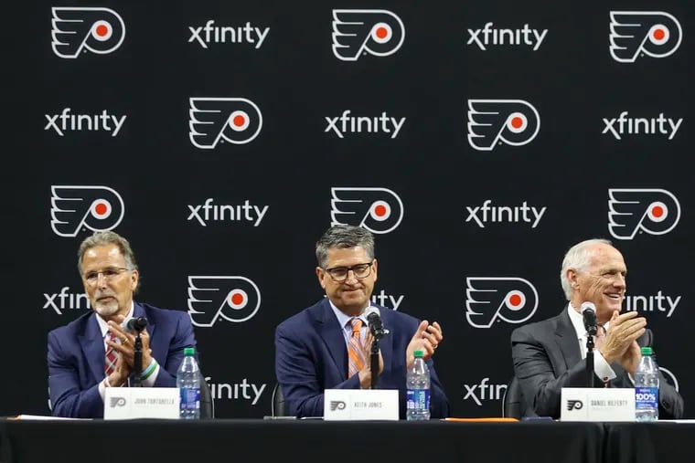 Keith Jones (center), and Dan Hilferty (right) have played a major role in a more transparent and hands-on Flyers' leadership group.