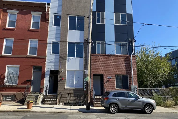 A 5-year-old girl was shot inside a residence on the 1800 block of North Sixth Street in North Philadelphia on Tuesday night, Nov. 3, 2020 ,police said. She is in stable condition at Temple University Hospital. Neighbors on the block said the girl lives with her parents in the second-floor apartment of the newly constructed apartment building in the right of this photo, taken Wednesday, Nov. 4, 2020.