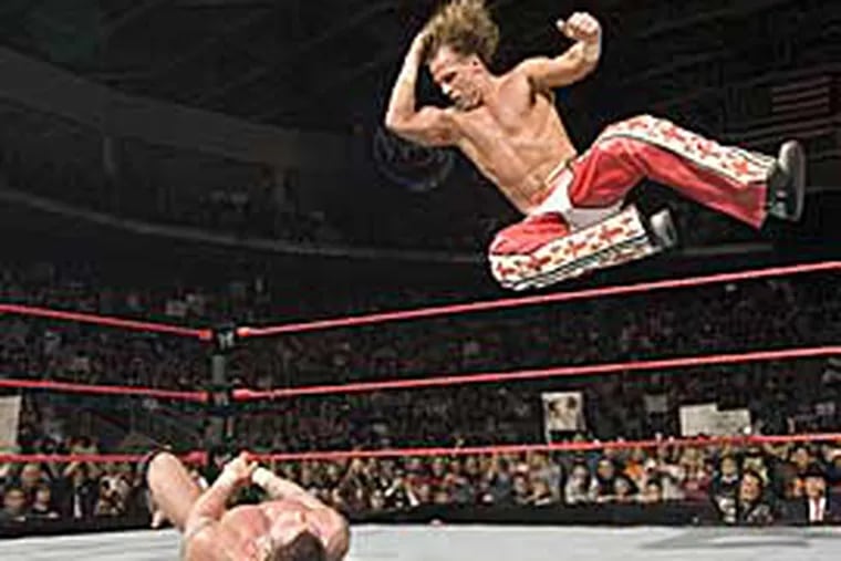 Shawn Michaels in mid air. He started wrestling because of Ric Flair and now may end his career.