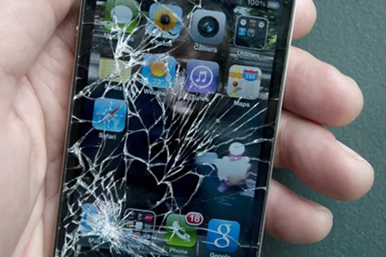 An iPhone with a cracked screen. A Pennsylvania lawmaker is proposing legislation that would force manufacturers to allow consumers to repair their broken devices without having to depend on the manufacturer for costly fixes.
