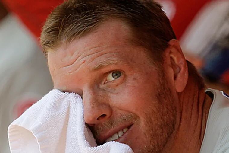 Roy Halladay's performance yesterday was not enough to top the Reds, as the Phillies lost, 4-3. (AP Photo/Al Behrman)