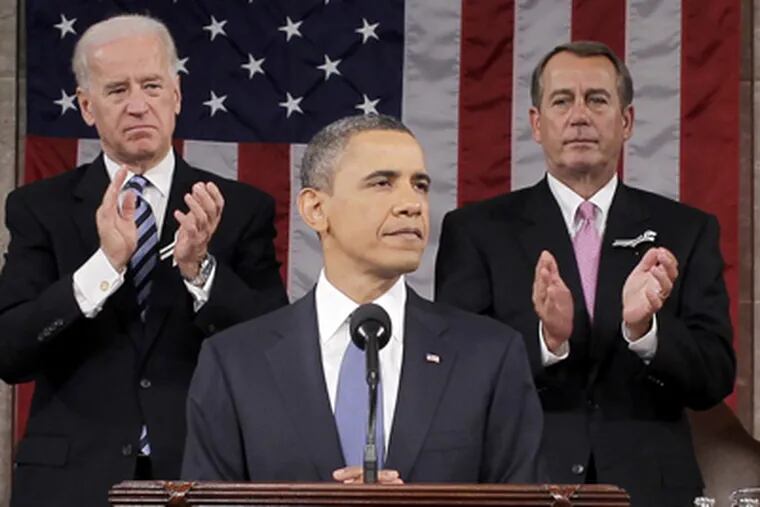 President Barack Obama is applauded by House Speaker John Boehner of Ohio and Vice President Joe Biden while delivering his State of the Union address on Capitol Hill in Washington, Tuesday, Jan. 25, 2011. (AP Photo/Pablo Martinez Monsivais, Pool)
