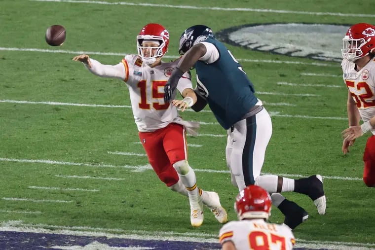 Philadelphia Eagles defensive tackle Jordan Davis pressures Kansas City Chiefs quarterback Patrick Mahomes during the third quarter of Super Bowl LVII at State Farm Stadium on Sunday, Feb. 12, 2023, in Glendale, AZ.