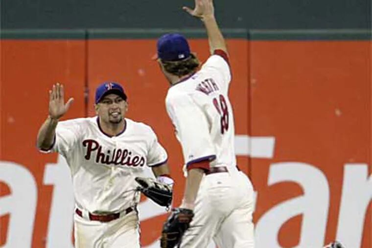 How do Shane Victorino, Jayson Werth and the Phillies outfield compare to the 1930 A's? (File photo)