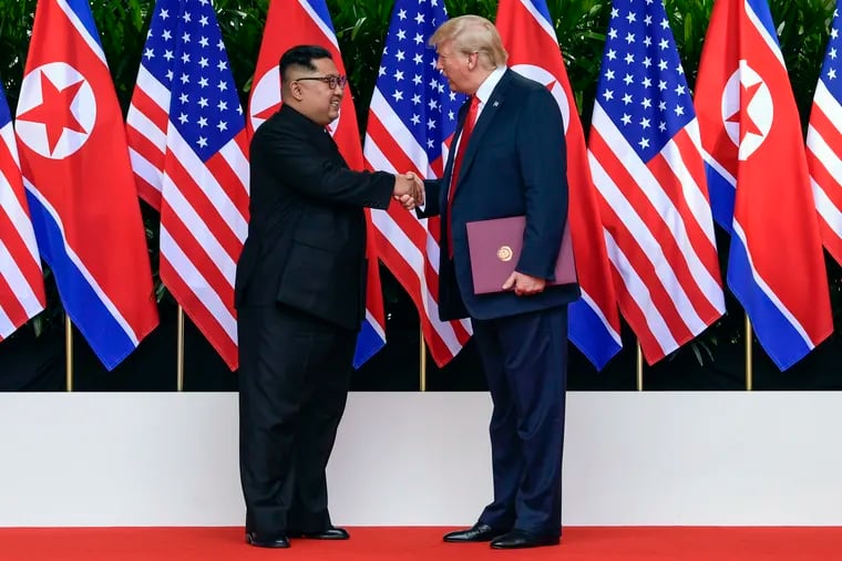 North Korea leader Kim Jong Un and U.S. President Donald Trump shake hands after their meetings at the Capella resort on Sentosa Island Tuesday, June 12, 2018 in Singapore.