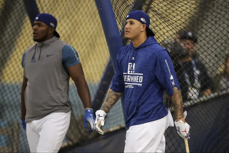 Manny Machado (right), Yasiel Puig, and their Dodgers teammates will face the Braves in an NL division series.