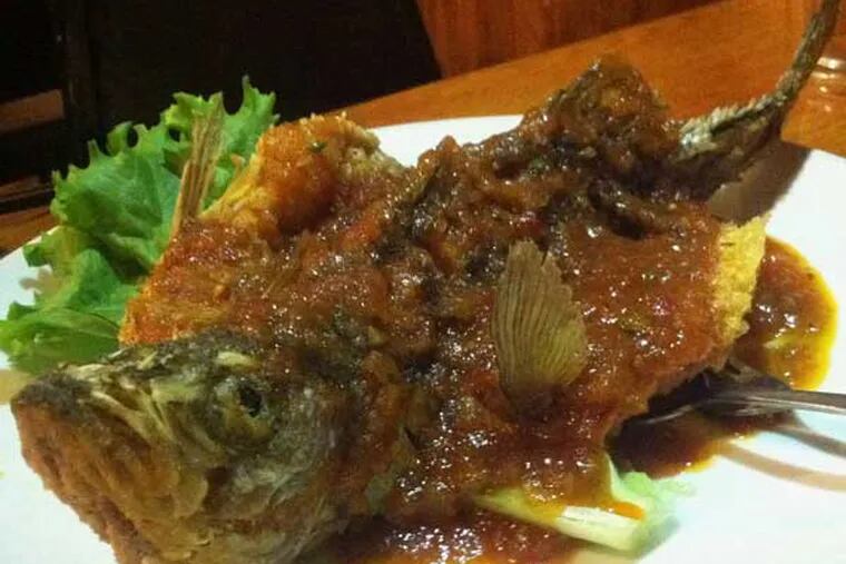 Crispy whole striped bass with Thai sauce at the Banana Leaf.