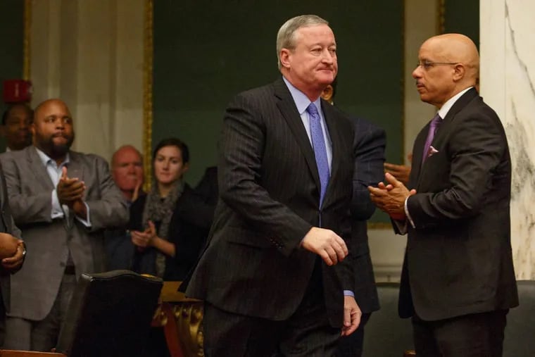 Mayor Kenney walks past State Sen. Vincent Hughes in City Council chambers Thursday morning  after announcing plans to dismantle the SRC.