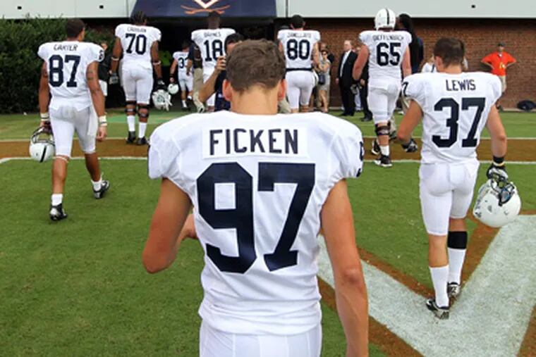 Penn State kicker Sam Ficken missed three field goals and an extra point in a loss to Virginia. (Andrew Shurtleff/AP Photo)