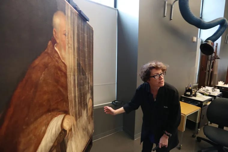 At the Perelman conservation lab, Teresa Lignelli, senior conservator of paintings, discusses treatment for Titian’s 1558 portrait of Archbishop Archinto.