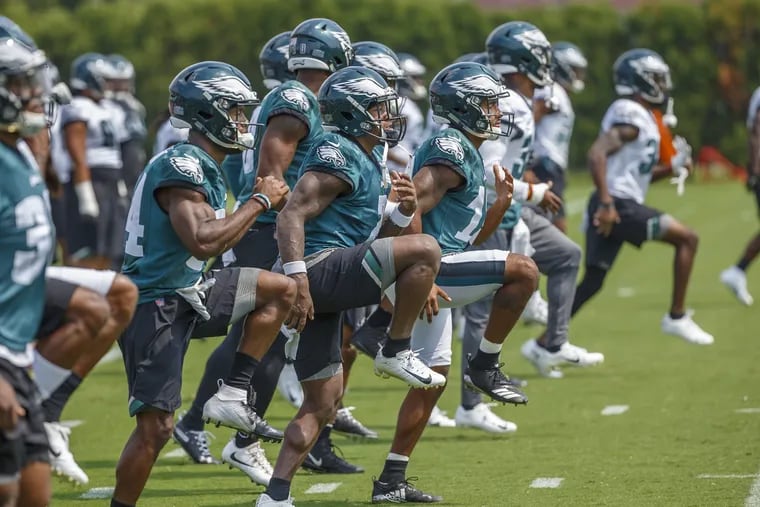 The Eagles run warm up drills at practice on Monday at the NovaCare Center on August 27, 2018.